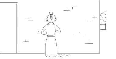 张三背对镜头，在墙上贴条.jpg